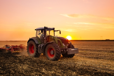 Tractor on soil in field